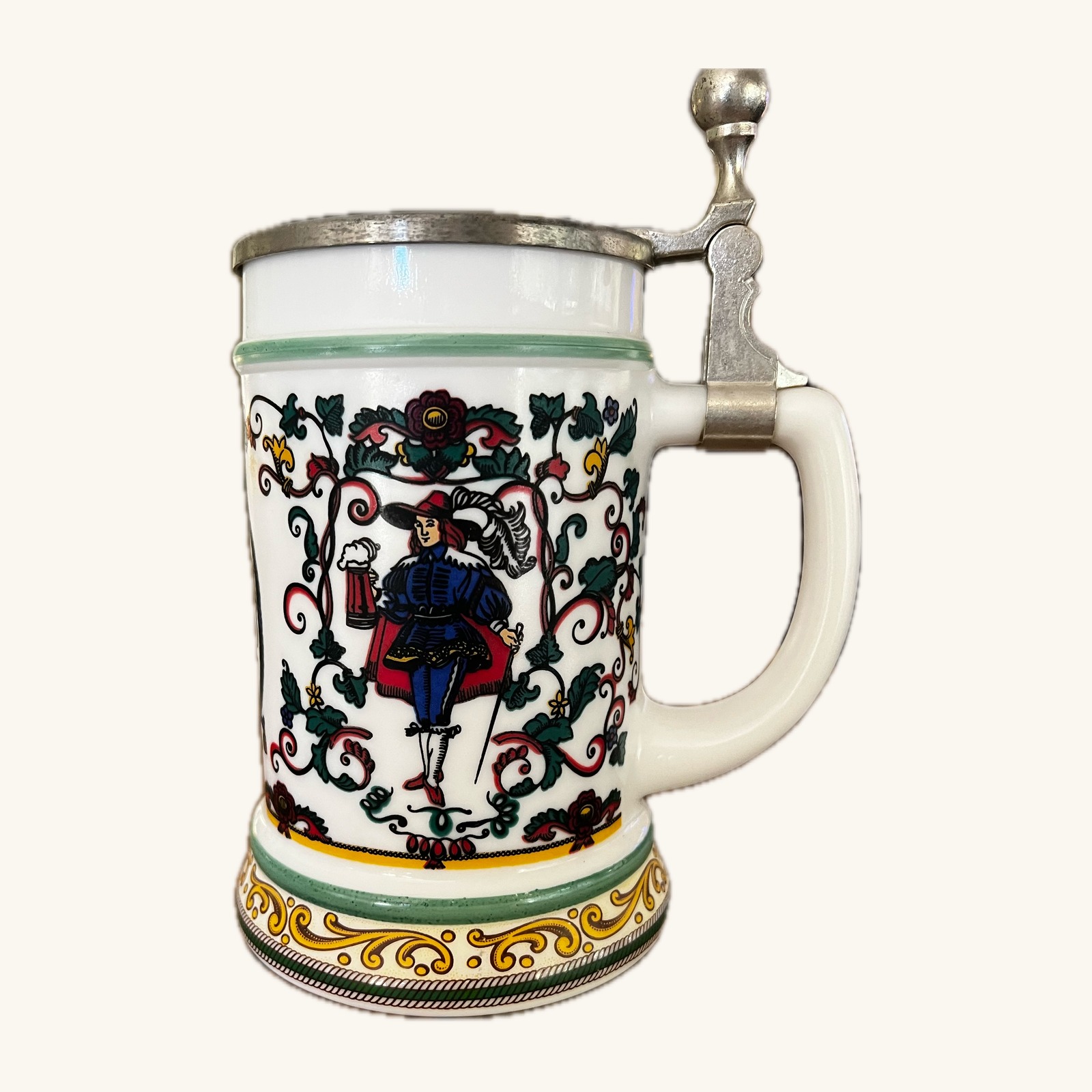 Cavalier-motif beer stein with pewter lid