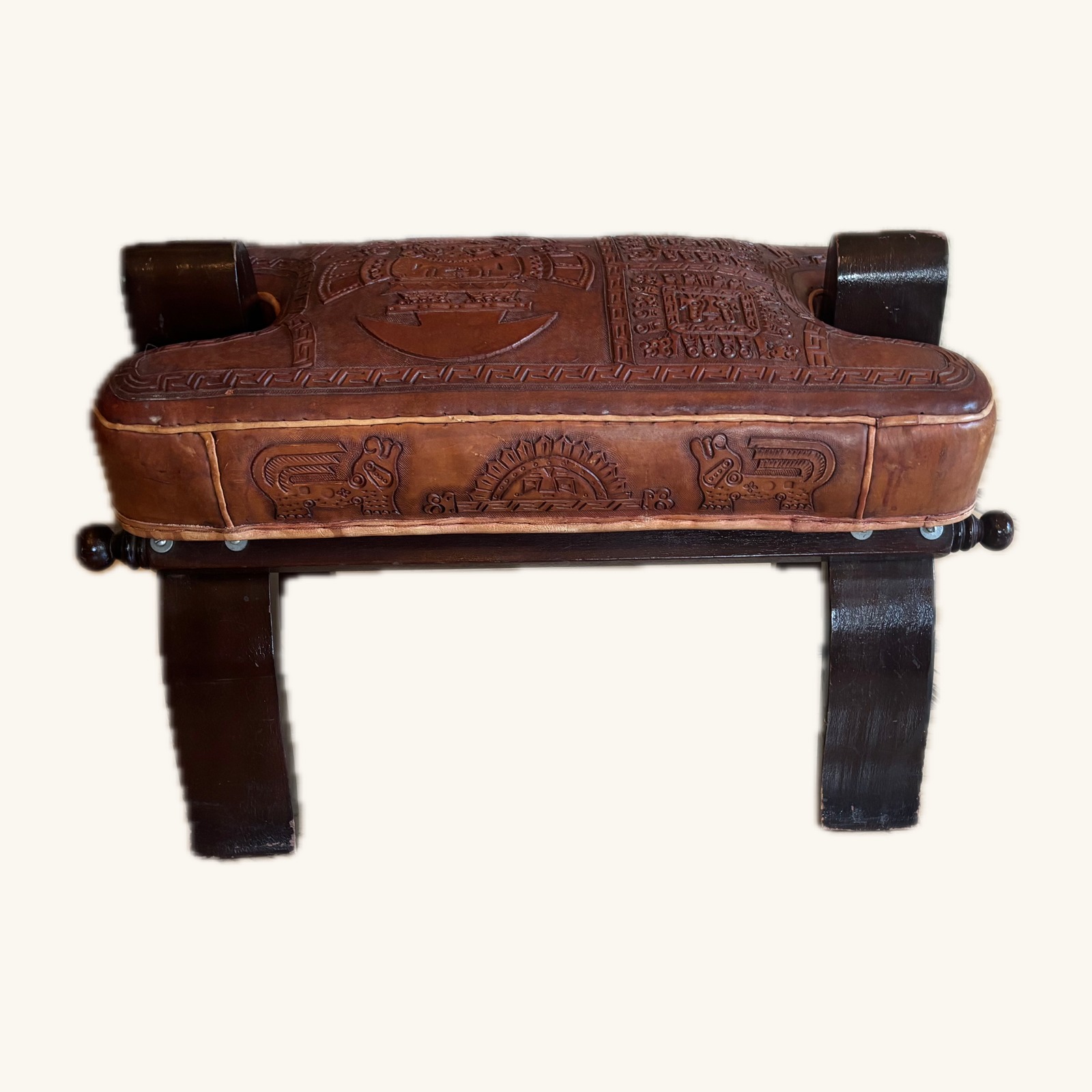 Tumi-embossed leather camel-saddle ottoman