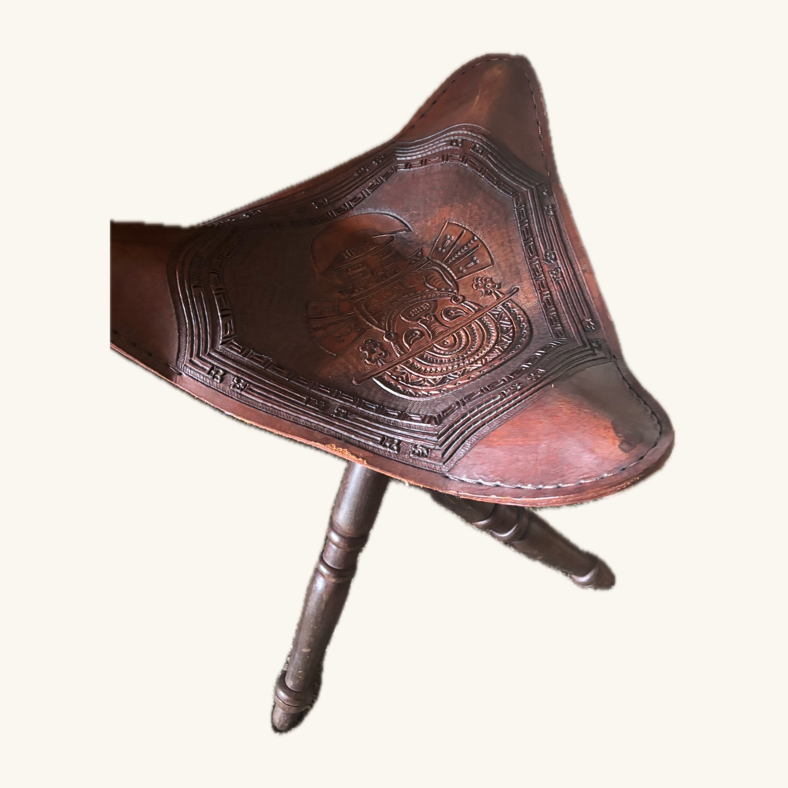 Tumi-embossed leather tripod stool